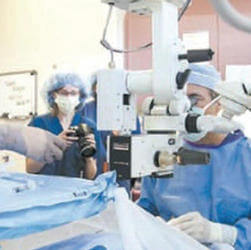 Dr. Paveloff performing eye surgery